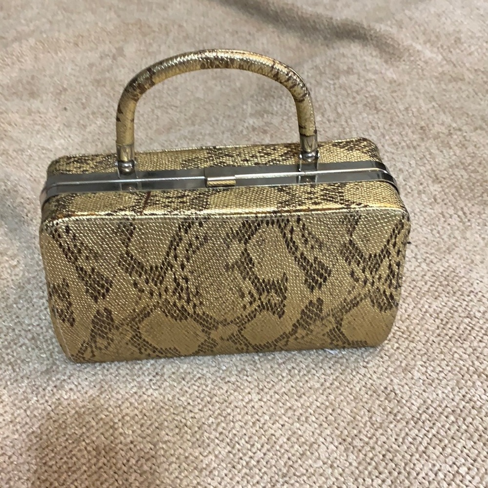 Python print vintage style hard shell sm. handbag.